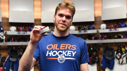 McDavid 100th assist puck